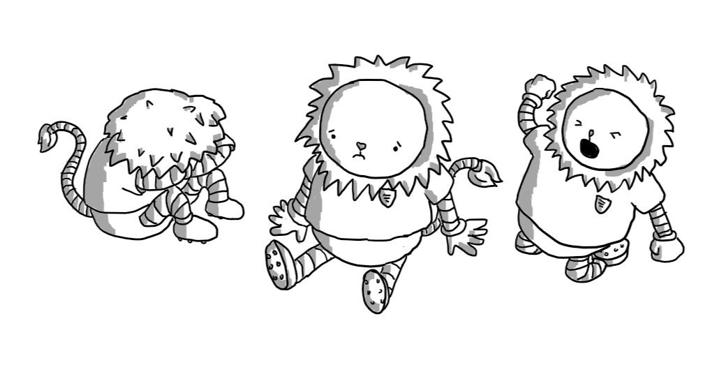 Three robots designed to look like anthropomorphic lions wearing football shirts and boots. One is sitting slumped with its head resting on its folded arms, one is sitting down looking miserable and one is on its knees crying in despair, shaking its fist at the skies.