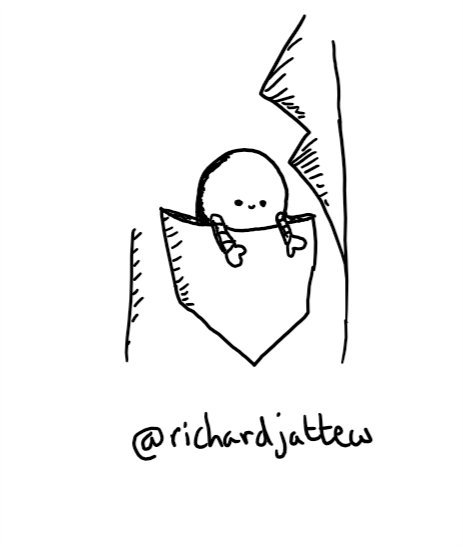 A tiny round robot in the breast pocket of a jacket, positioned with its arms hanging out over the side and its little smiley face poking out.