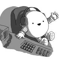 A smiling, spherical robot with banded arms and legs, sitting on a chair at a mixing console and wearing headphones.