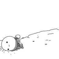 A smiling, spherical robot with banded legs, lying on its side, partially embedded in a stretch of barren, rocky landscape.
