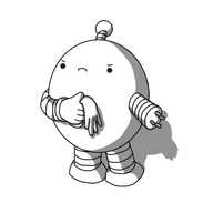 An ovoid robot with banded arms and legs and an antenna. One of its hands is missing, leaving a four-pronged plug connector at the end of its arm, and it holds what is presumably the missing hand - now hanging limply like a glove, poised to slap - in its other hand. It looks quite grumpy.