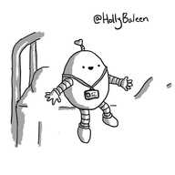 A smiling, egg-shaped robot sitting on the edge of a hospital bed. It is wearing an ID-badge on a lanyard and has an antenna with a heart-shaped tip.