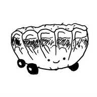 A robot in the form of a large serving bowl filled with a traditional layered trifle. It has a smiling face on the front and four little wheels on the bottom.